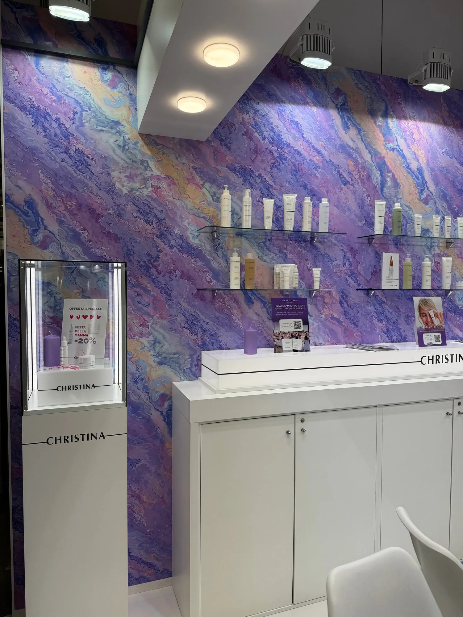 Bologna 2025 — the exhibition stand wrapped in a violet quartzite graphic