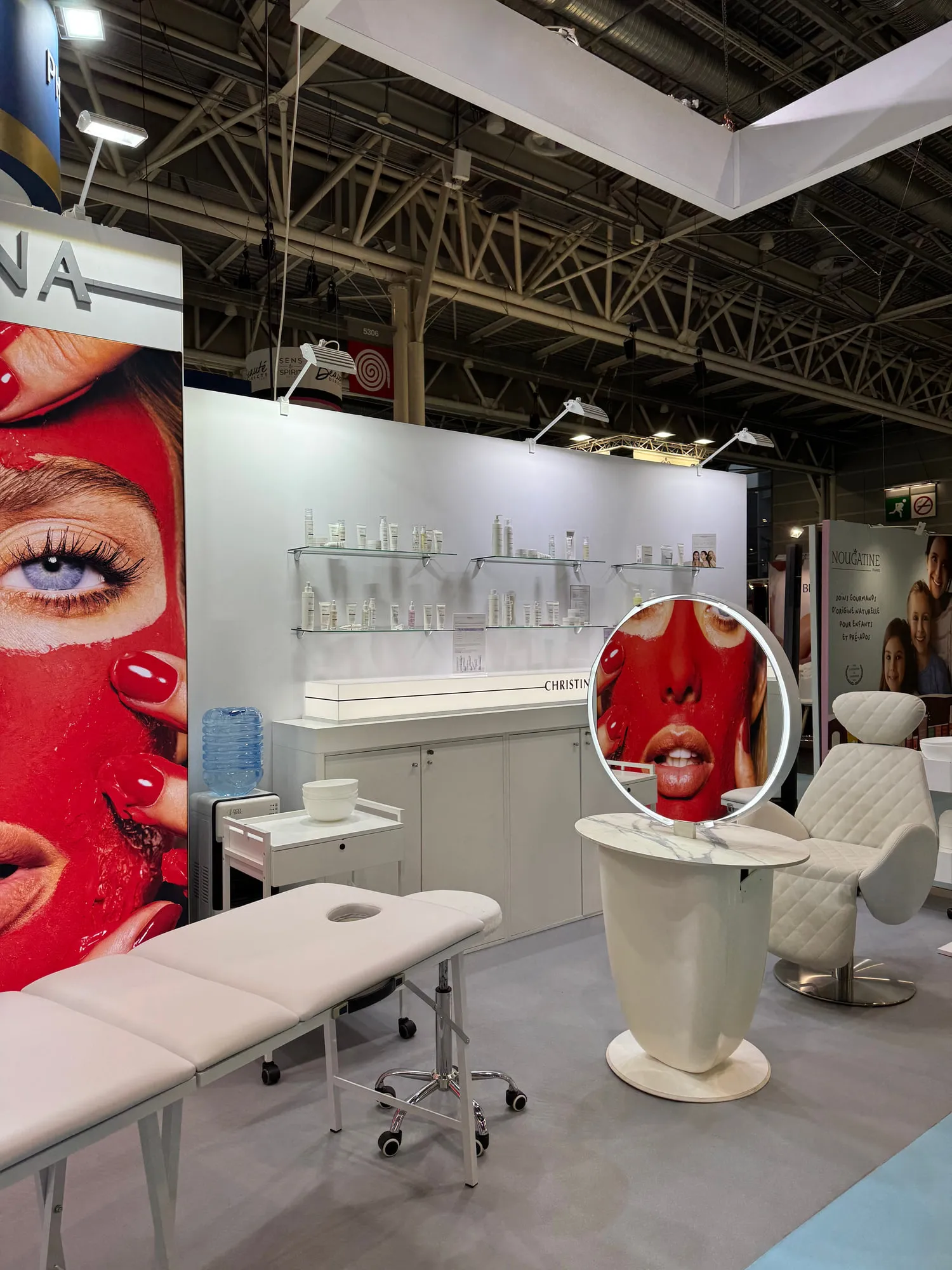 Paris 2025 — campaign wall and treatment stations on the stand