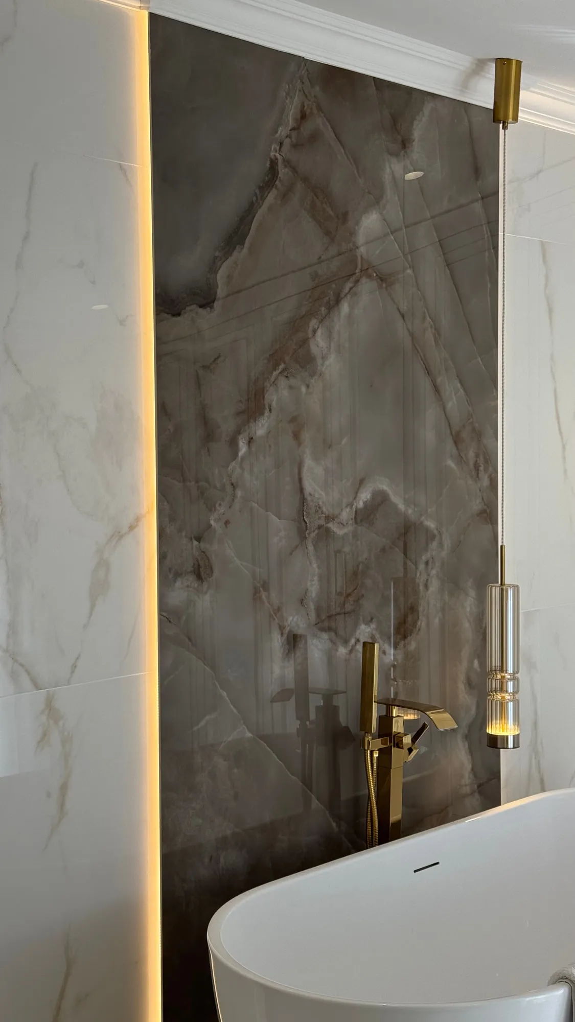 La Villa — marble, brass and lacquered joinery in the finished villa