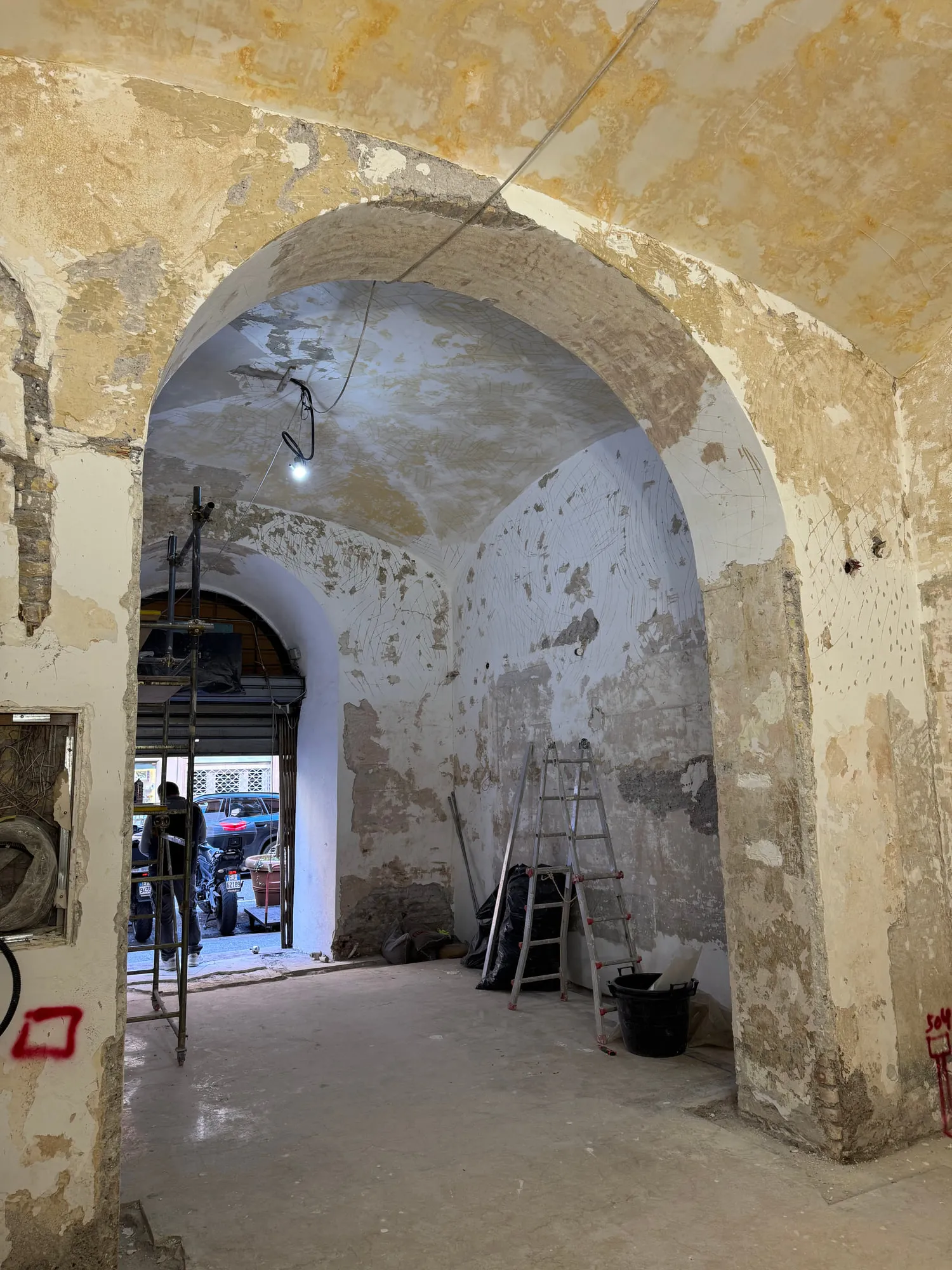 Christina Roma — the vaulted shell before restoration, plaster stripped to the brick