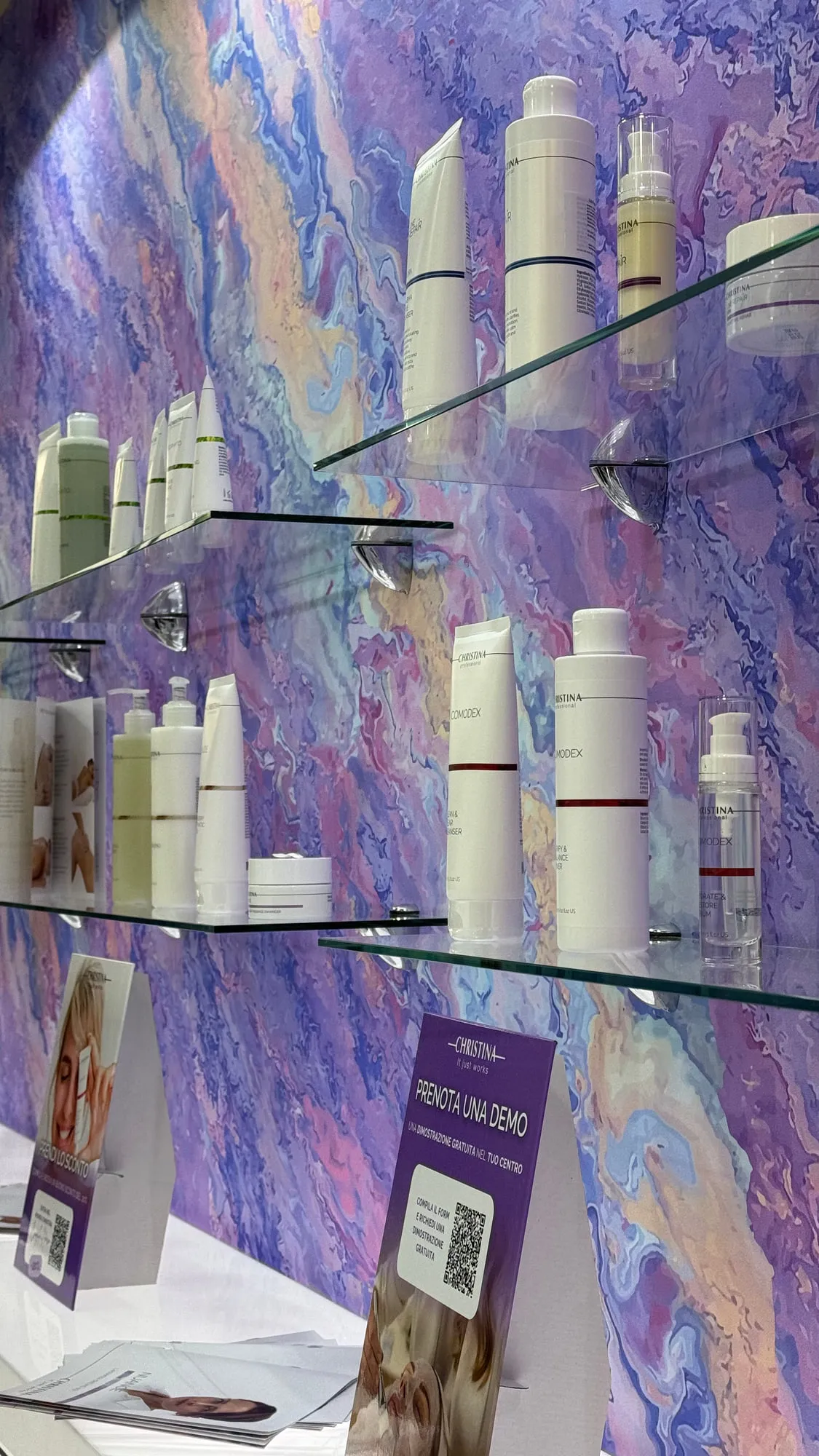 Bologna 2025 — the exhibition stand wrapped in a violet quartzite graphic