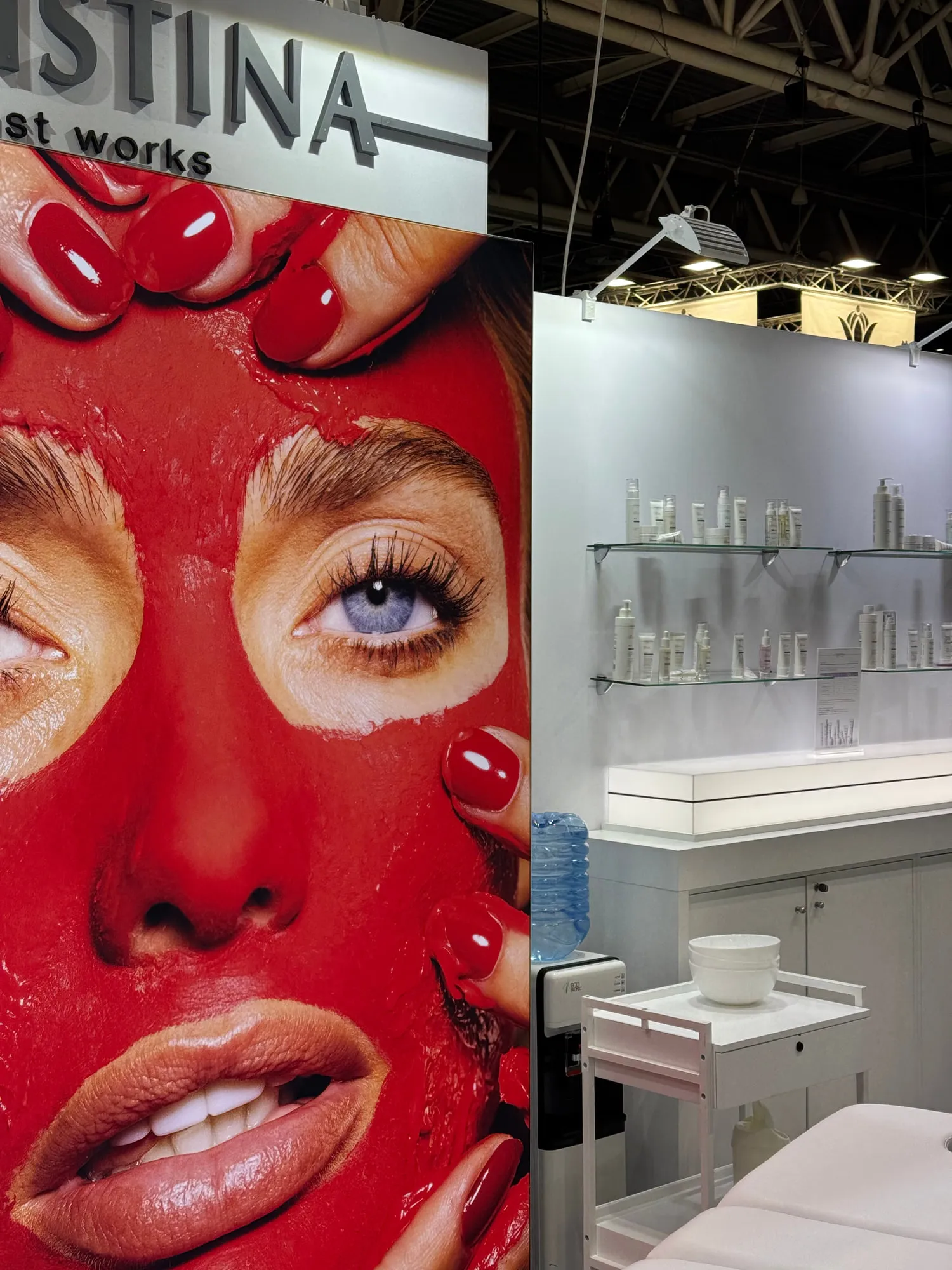 Paris 2025 — campaign wall and treatment stations on the stand