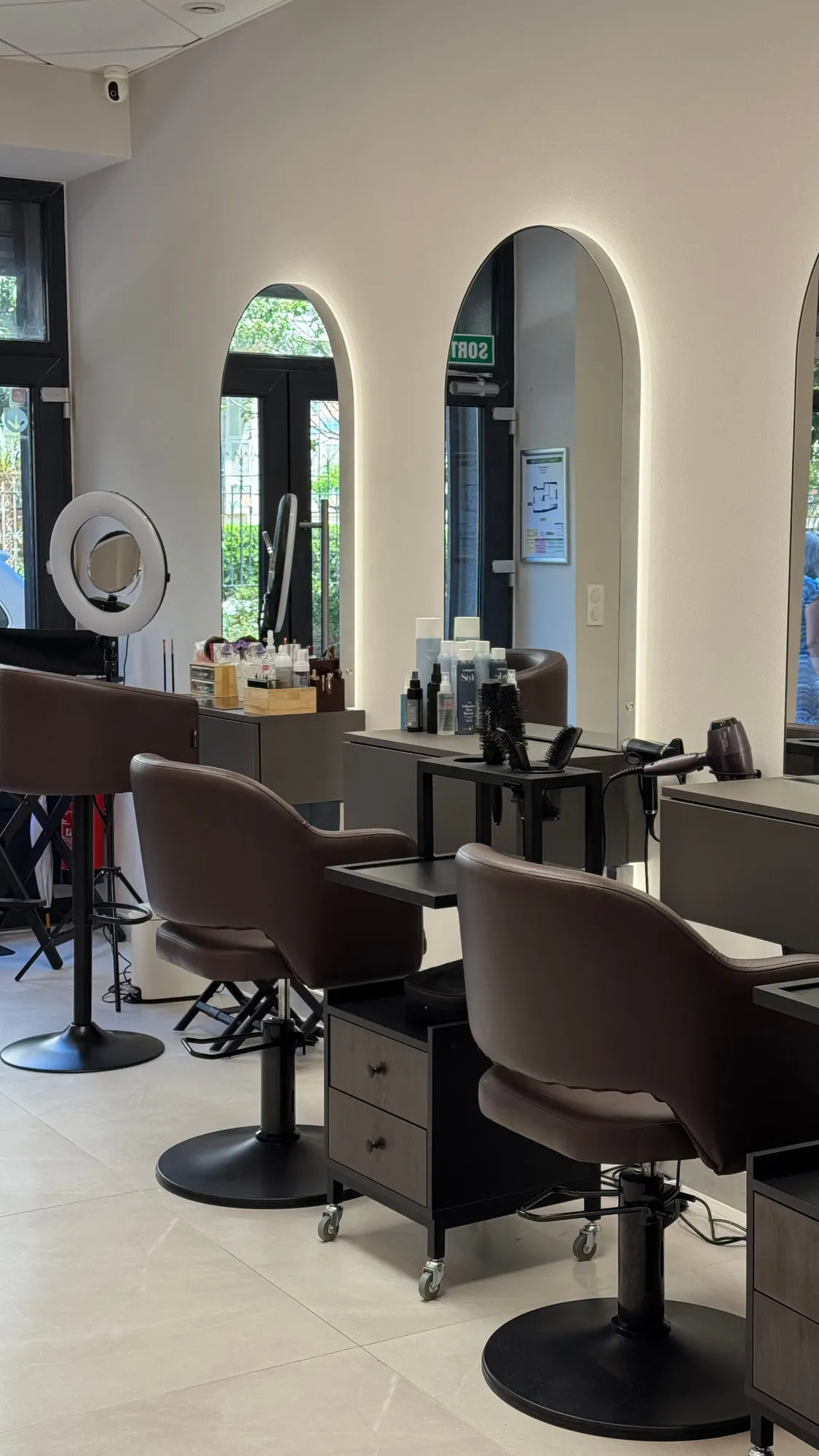 Larimar — the sculpted plaster face behind the styling stations