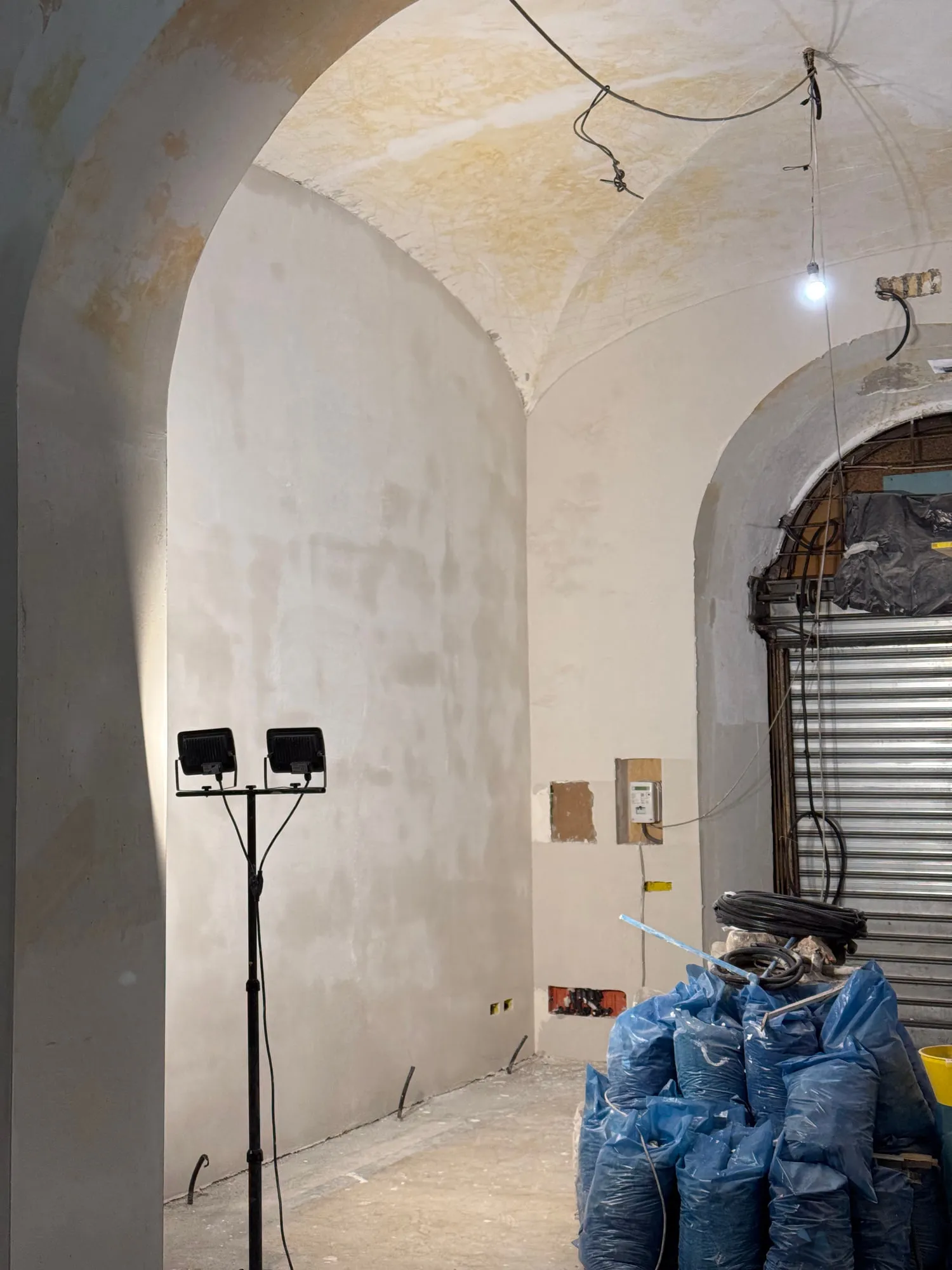 Christina Roma — the vaulted shell before restoration, plaster stripped to the brick