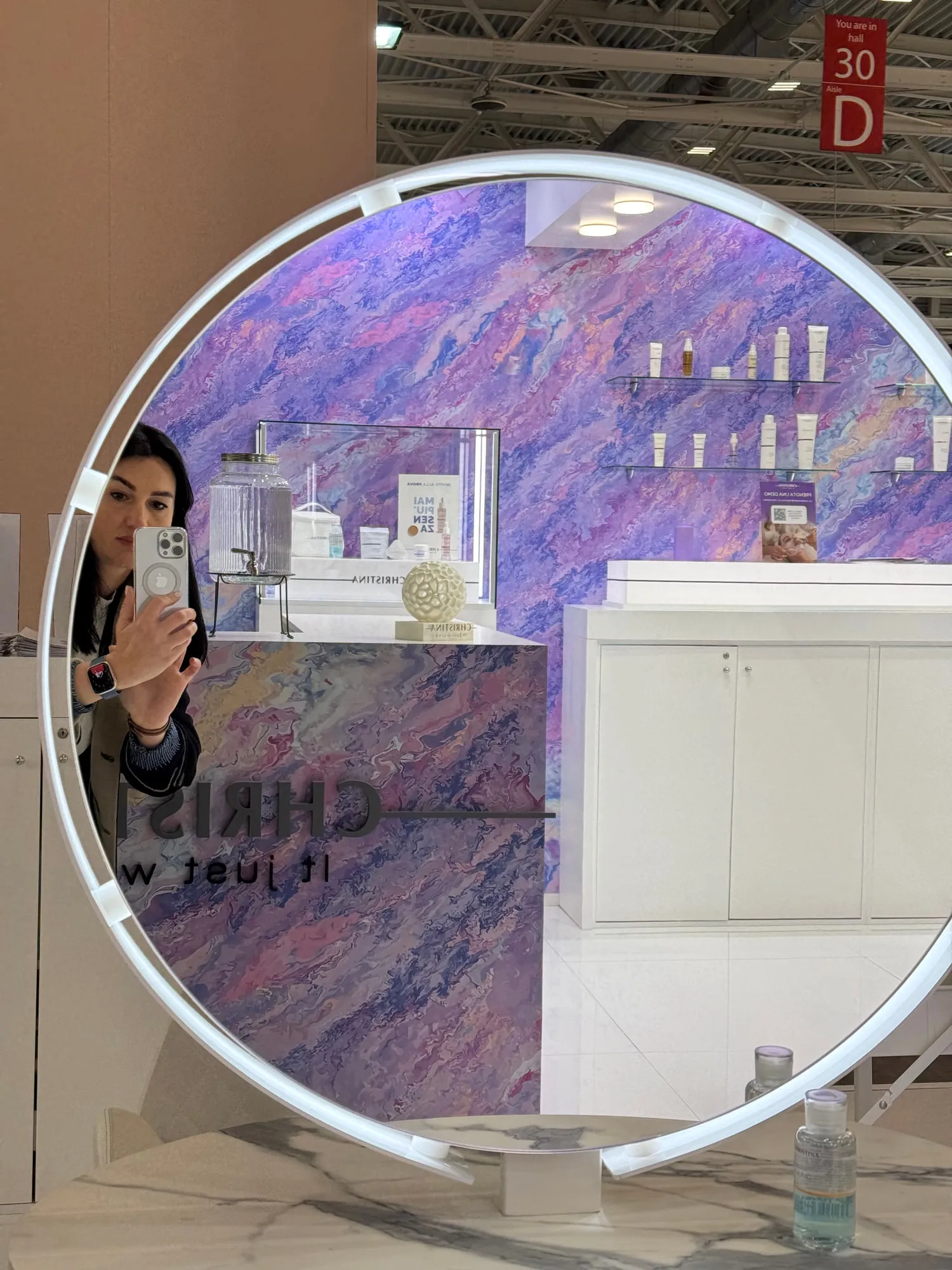 Bologna 2025 — the exhibition stand wrapped in a violet quartzite graphic