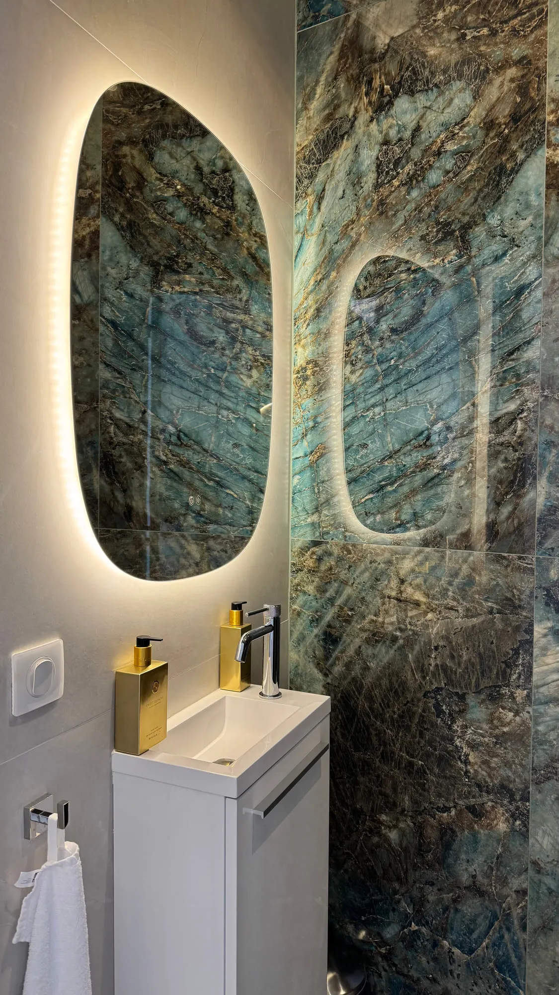 Larimar — the sculpted plaster face behind the styling stations
