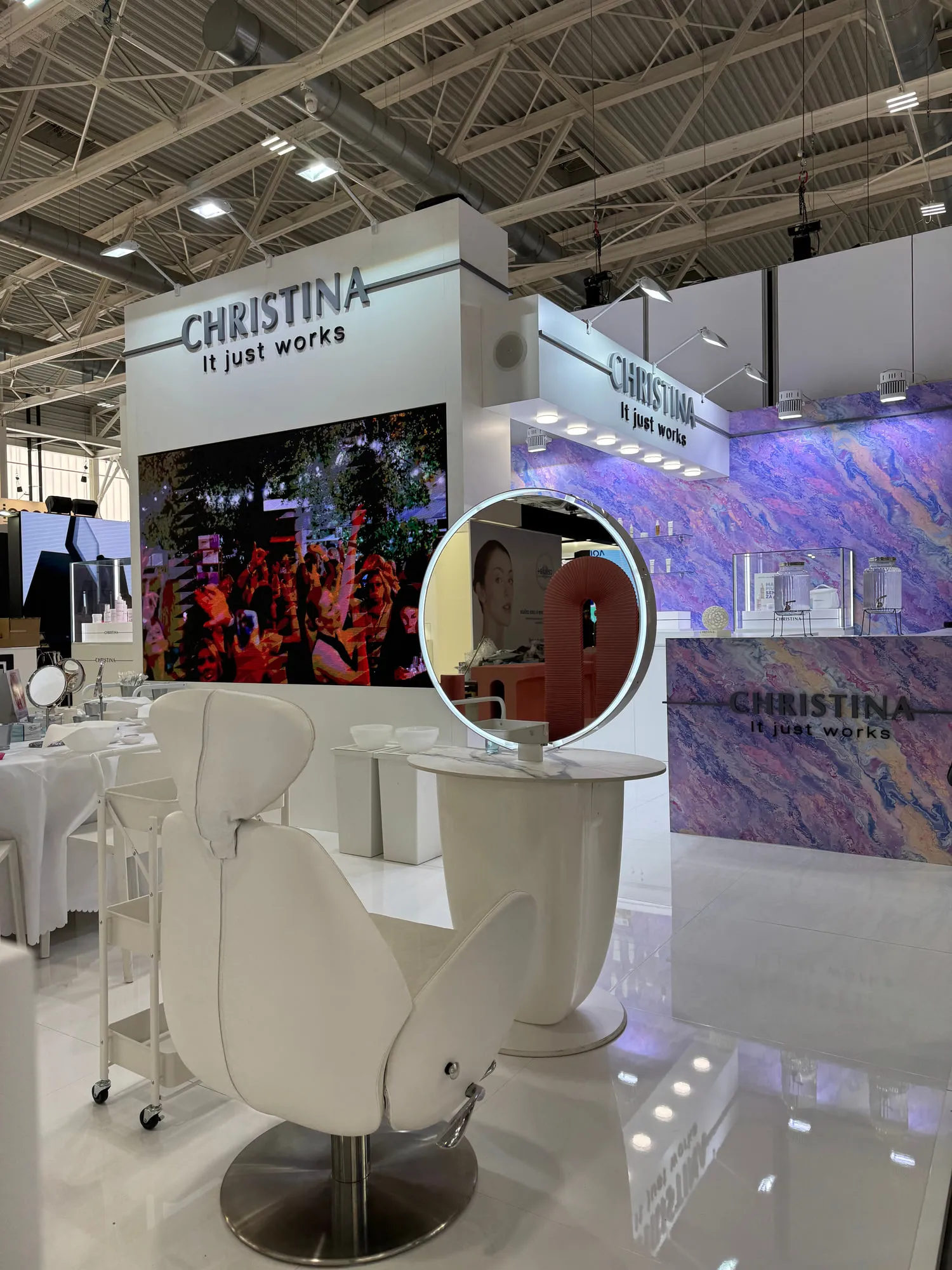 Bologna 2025 — the exhibition stand wrapped in a violet quartzite graphic