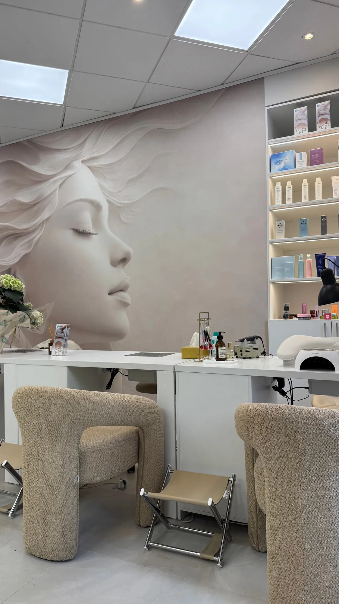 Larimar — the sculpted plaster face behind the styling stations
