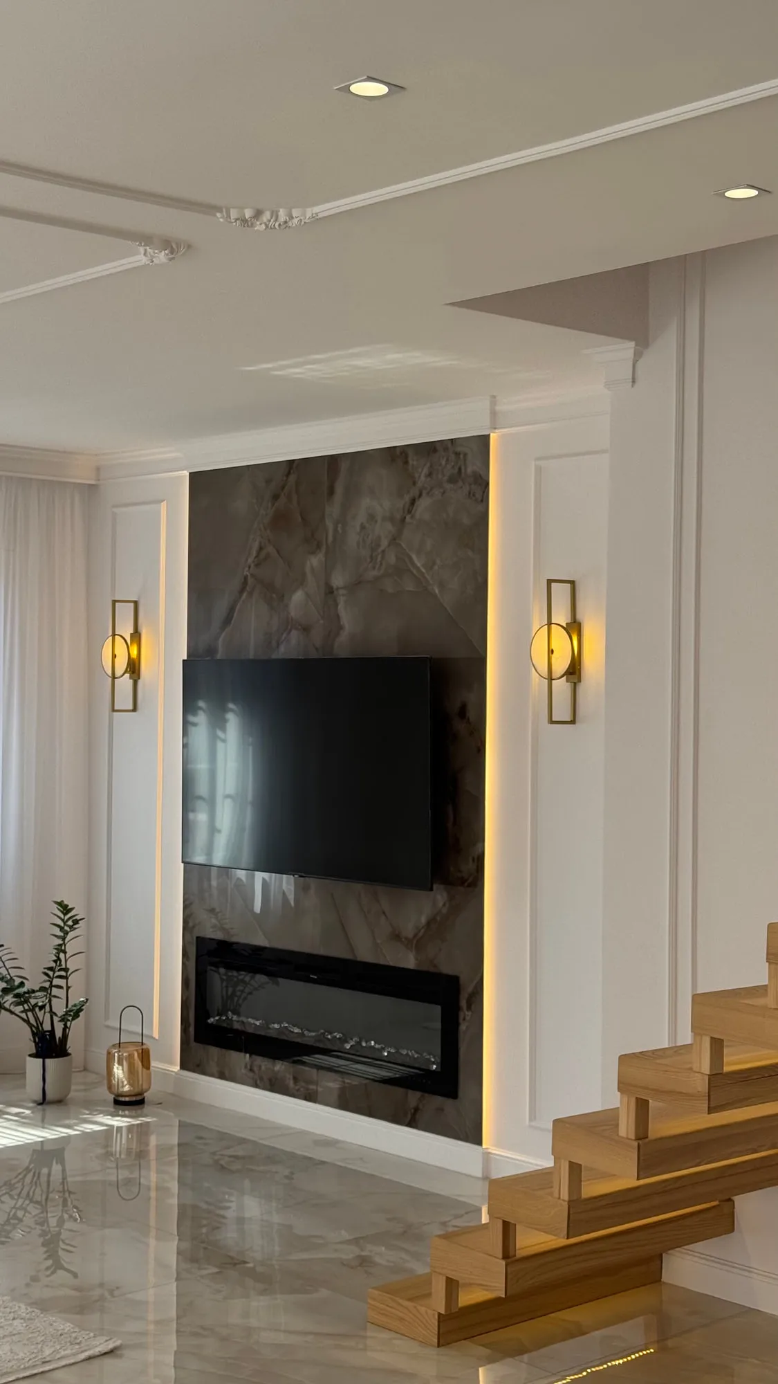 La Villa — marble, brass and lacquered joinery in the finished villa