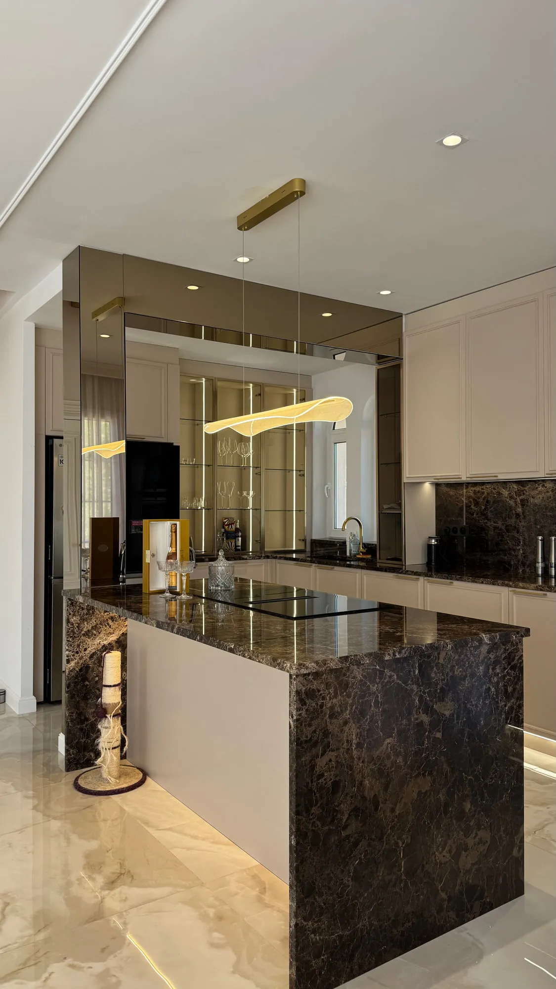 La Villa — marble, brass and lacquered joinery in the finished villa