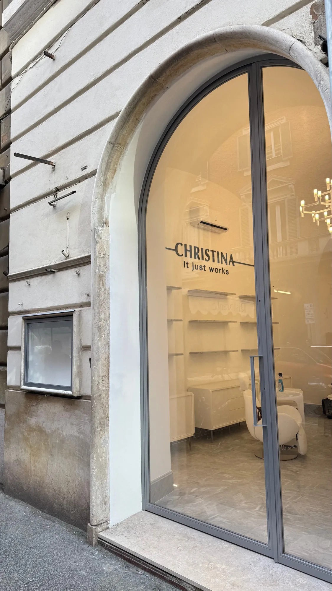 After — The arched shopfront, before and after