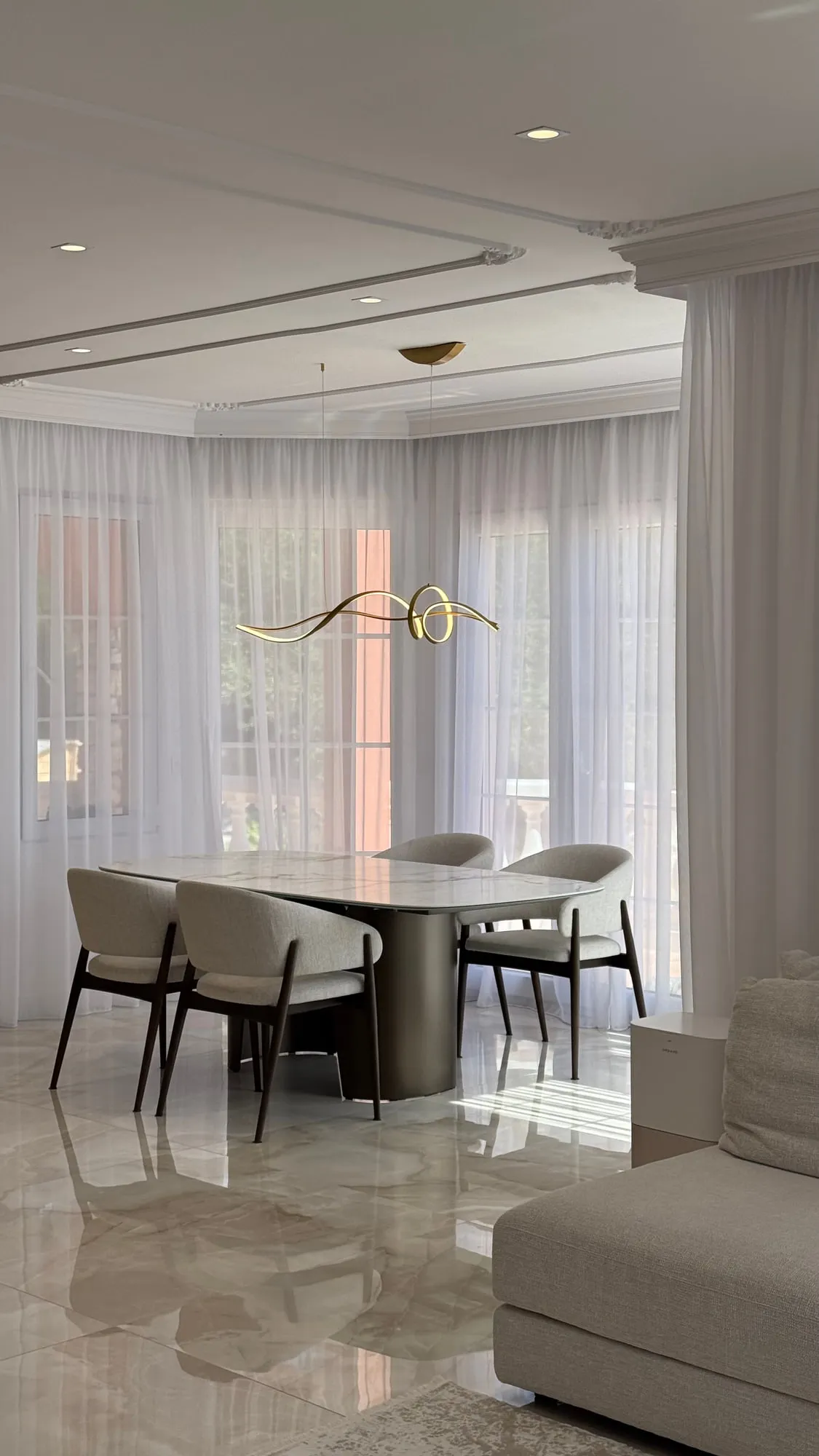 La Villa — marble, brass and lacquered joinery in the finished villa