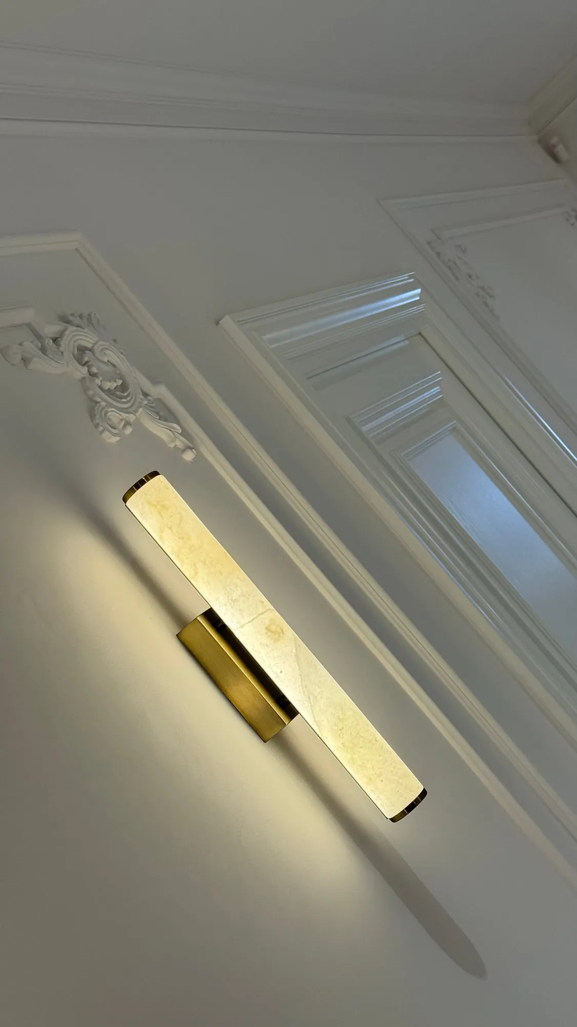 La Villa — marble, brass and lacquered joinery in the finished villa