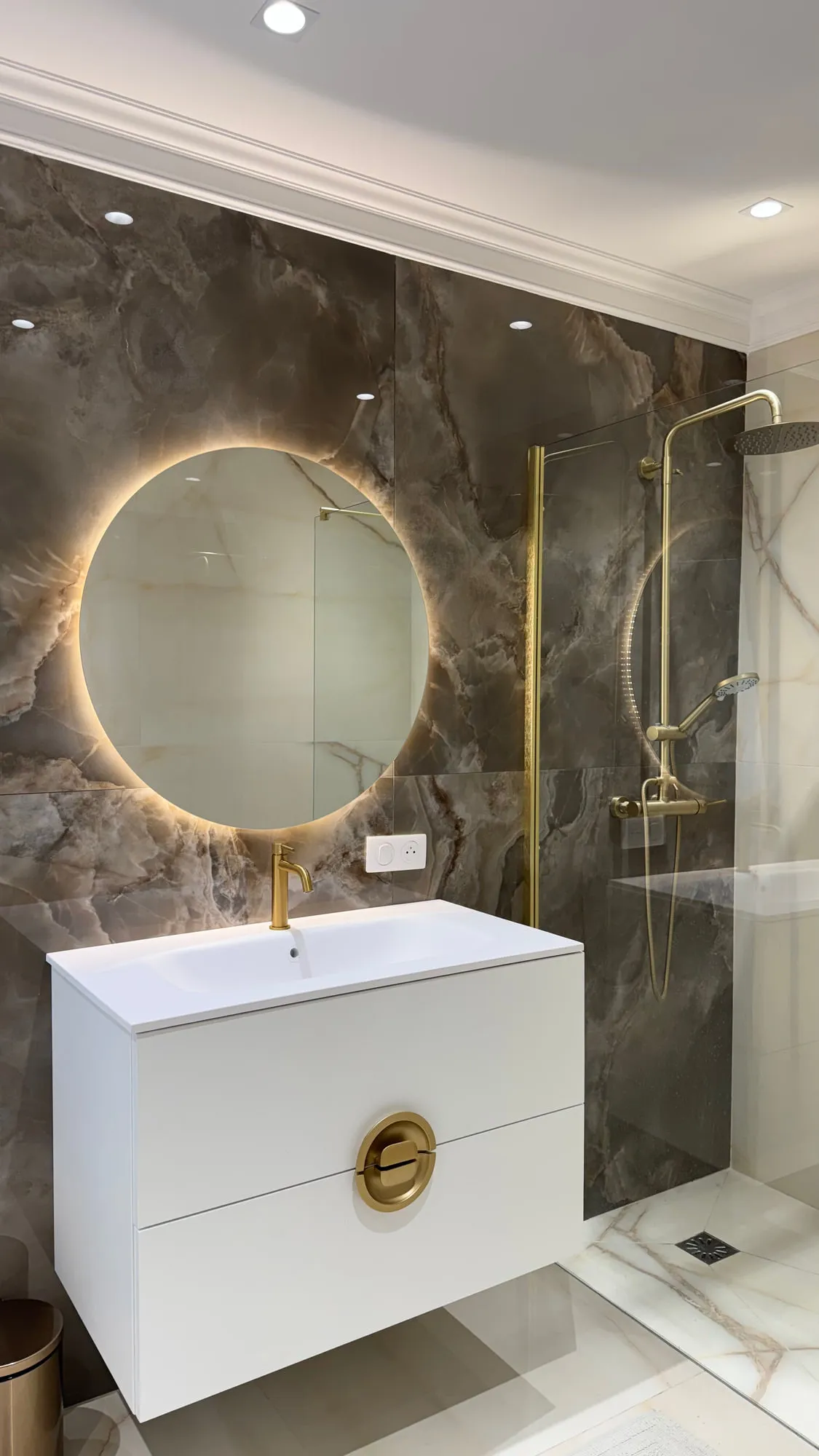 La Villa — marble, brass and lacquered joinery in the finished villa