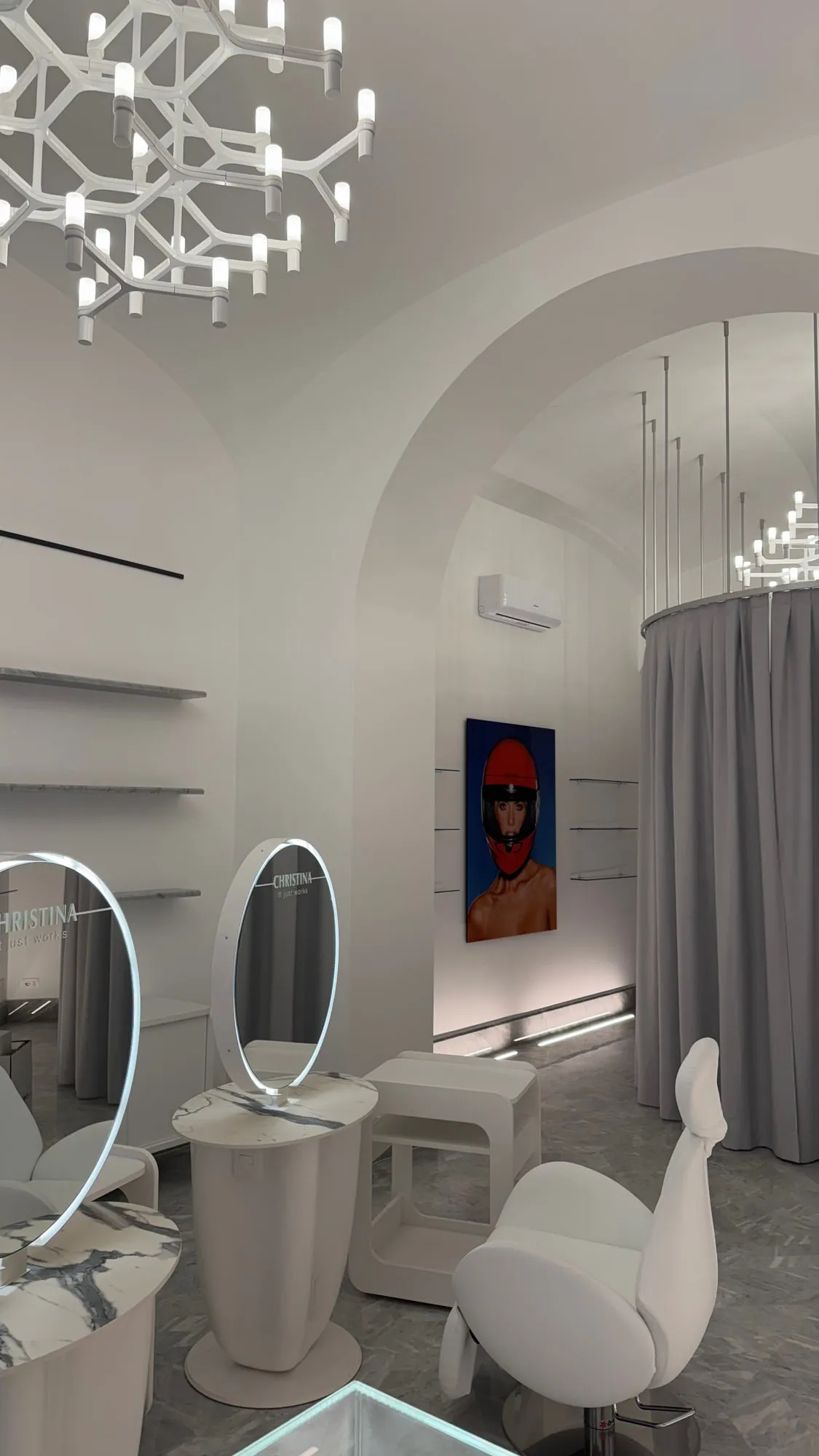 Christina Roma — the restored vault with oval mirrors and sculptural seating